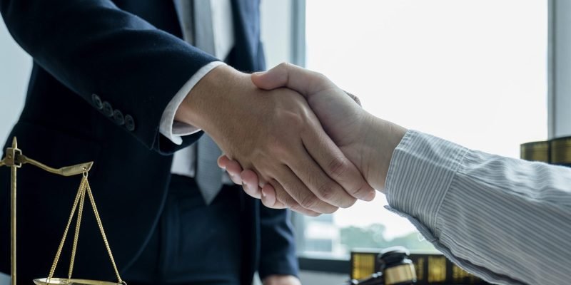 handshake-after-lawyer-providing-legal-consult-bus-2026-01-08-00-19-50-utc-scaled-1.jpg